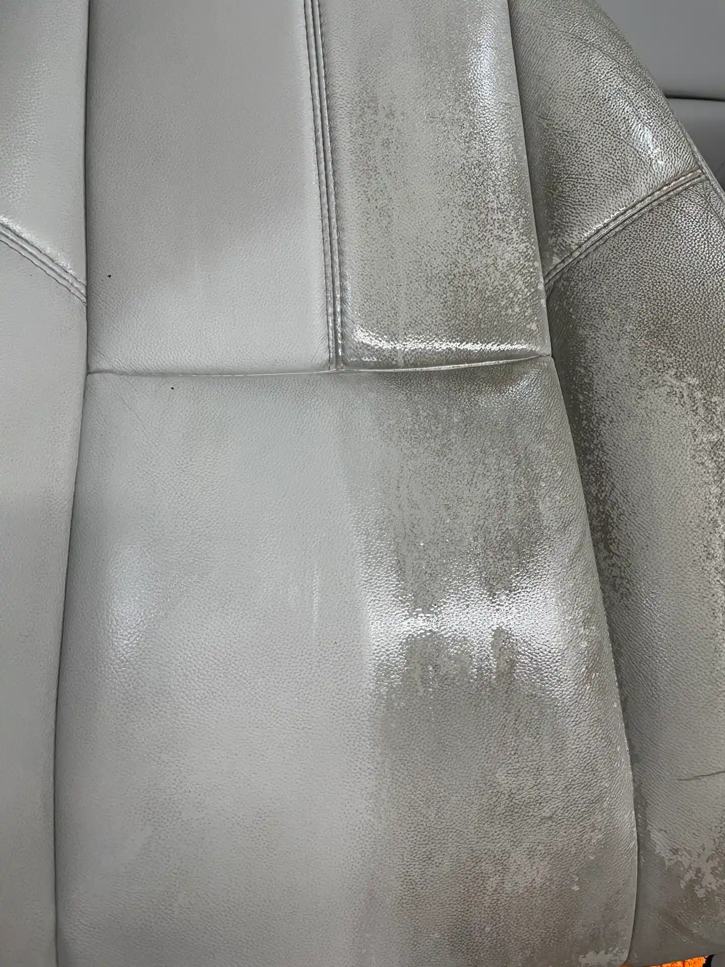 A close up of the seat back of a car